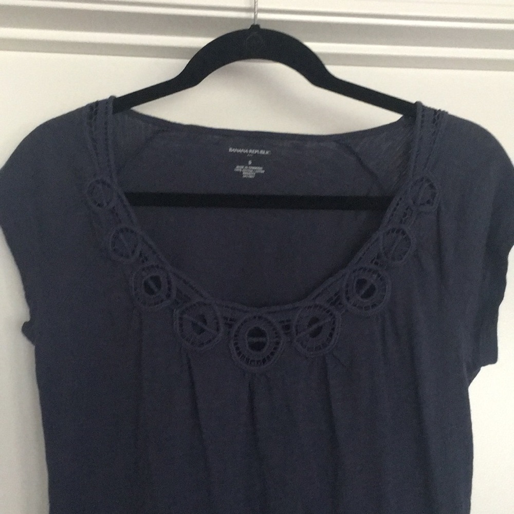 Purple top with neckline detail